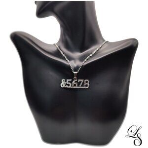 Silver Rhinestone “&5678” Pendant Necklace